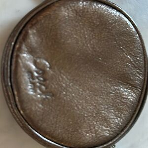 Coach metallic round wristlet